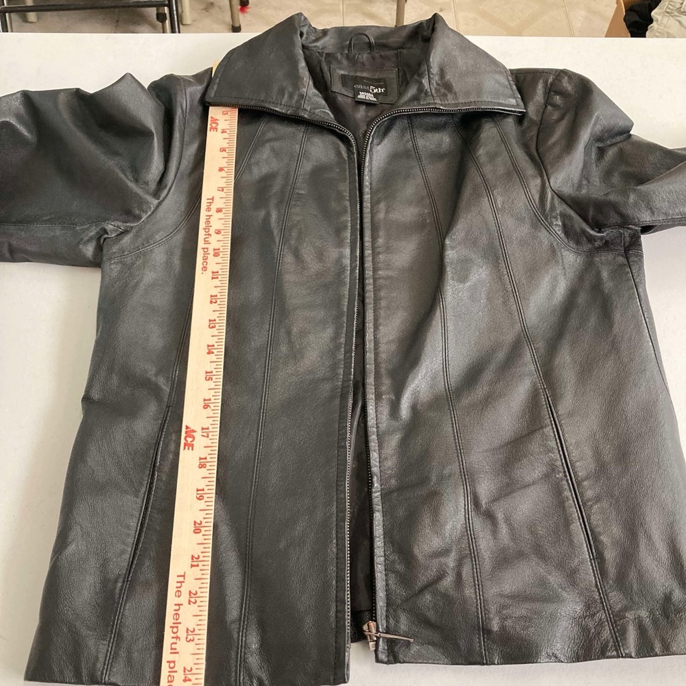 90’s Black Leather Jacket
Rebellious Leather Layers
